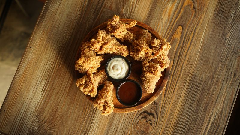 wings over — crispy buffalo wings platter at Wings over Boston